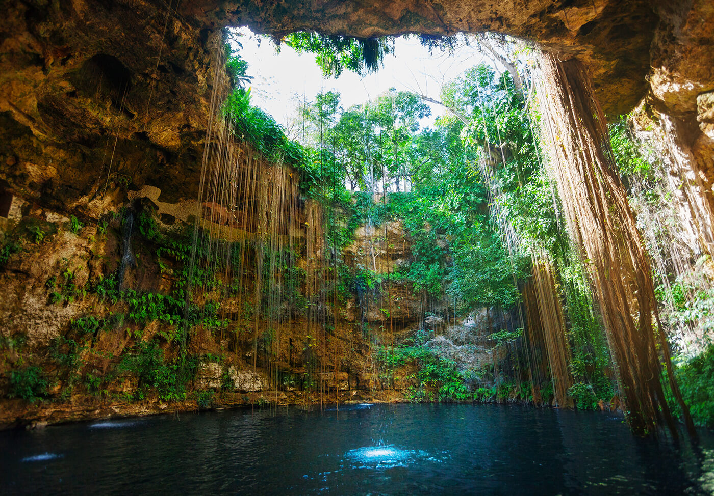 Cenote Ik Kil in Mexico is a great place to cool off after a morning at  Chichen Itza 